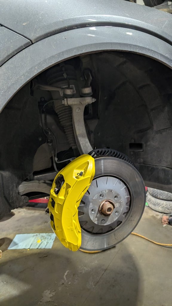 Yellow caliper paint