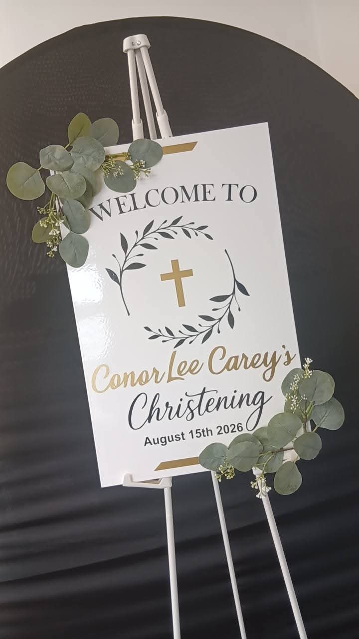 Conor Lee Carey's christening welcome sign with laurel wreath and cross
