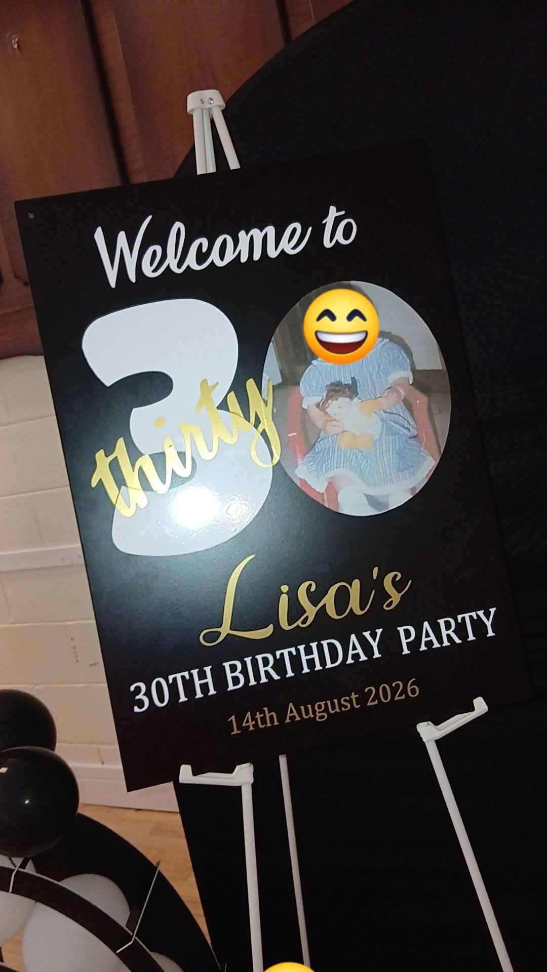 Lisa's 30th birthday party welcome sign with gold script and photo