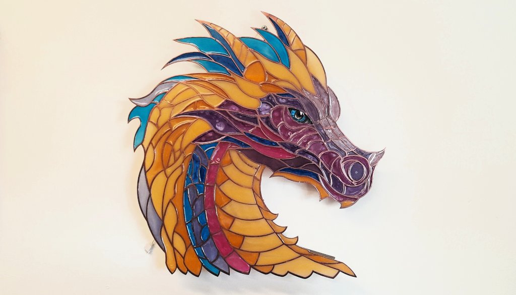Stained glass style dragon head resin art in gold purple and turquoise