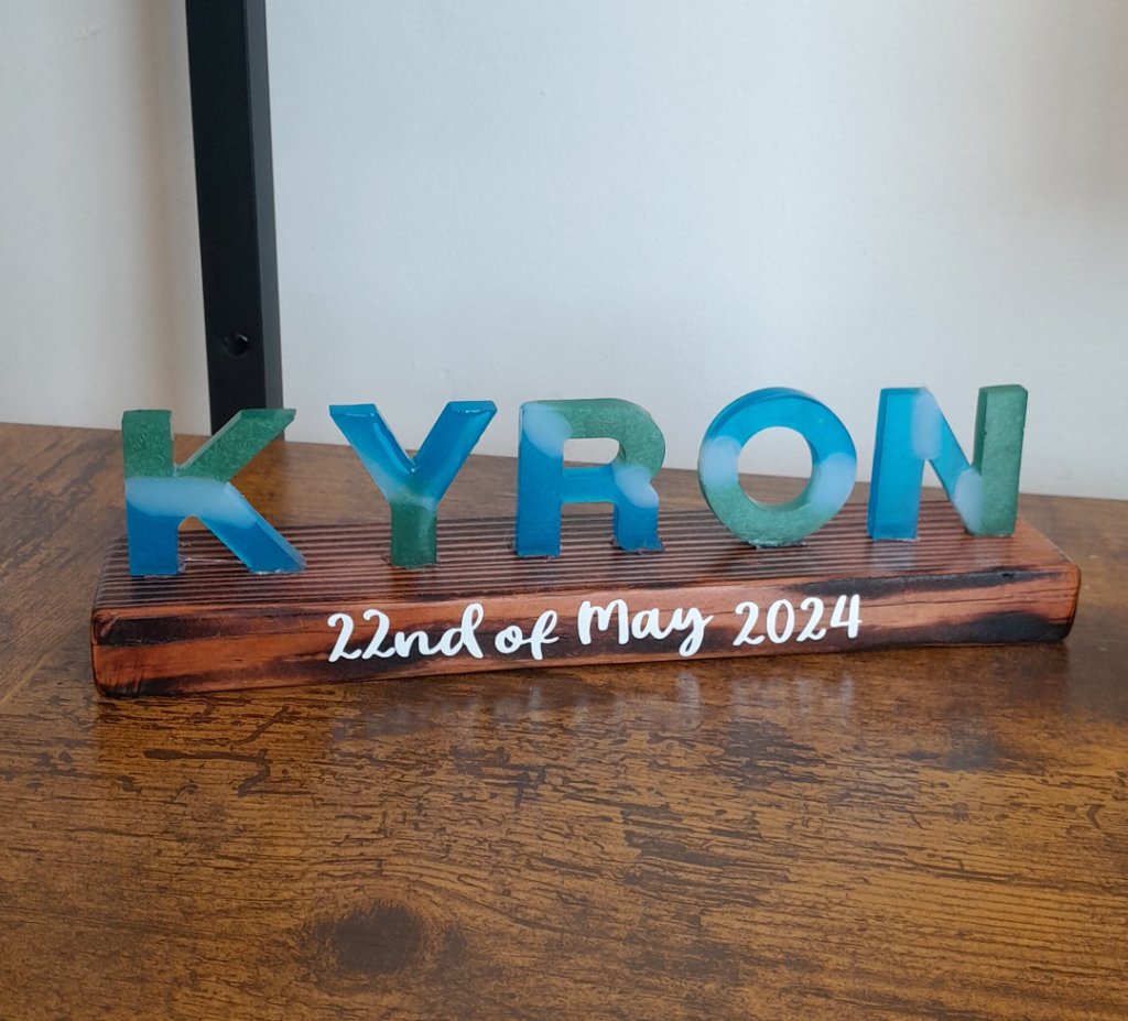 Kyron resin letter name sign on wood base 22nd of May 2024