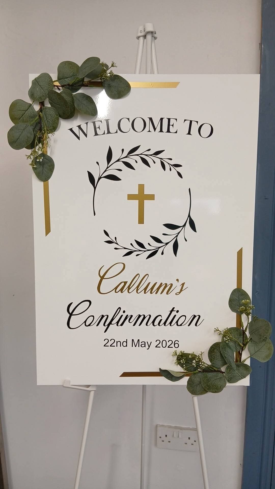 Callum's confirmation welcome sign with laurel wreath and gold cross