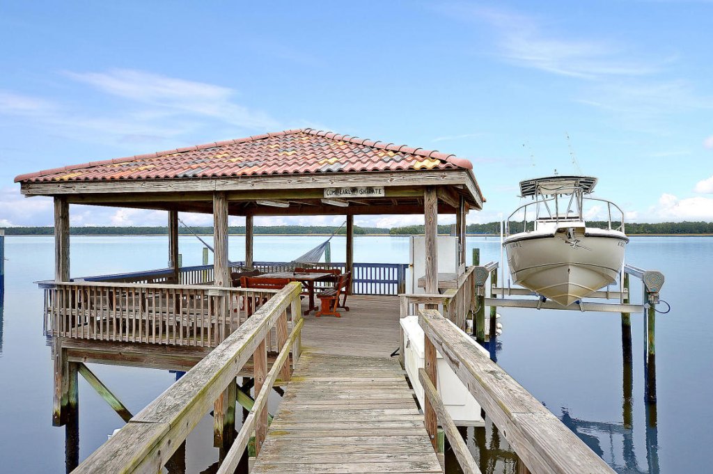 Residential dock with boat lift on a South Carolina tidal creek