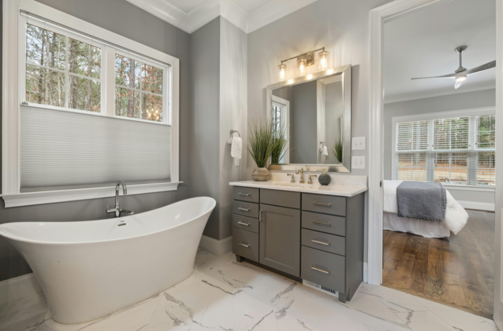 Renovated coastal kitchen with white cabinetry and large center island