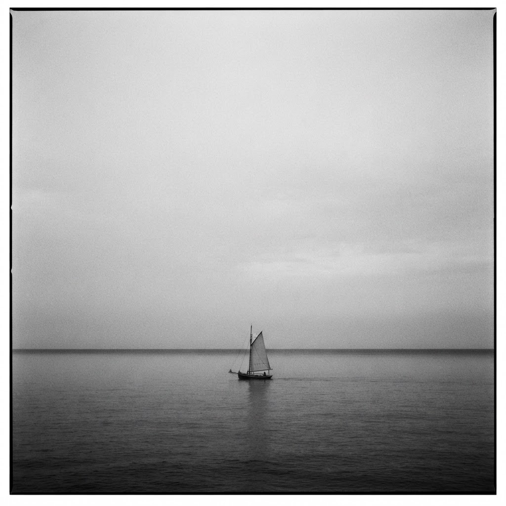 Sailboat on a misty sea