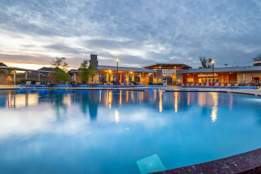 Trinity Falls McKinney Texas resort pool at sunset
