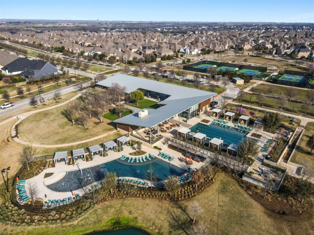 Aerial view of Windsong Ranch amenity center and pool — Prosper, Texas