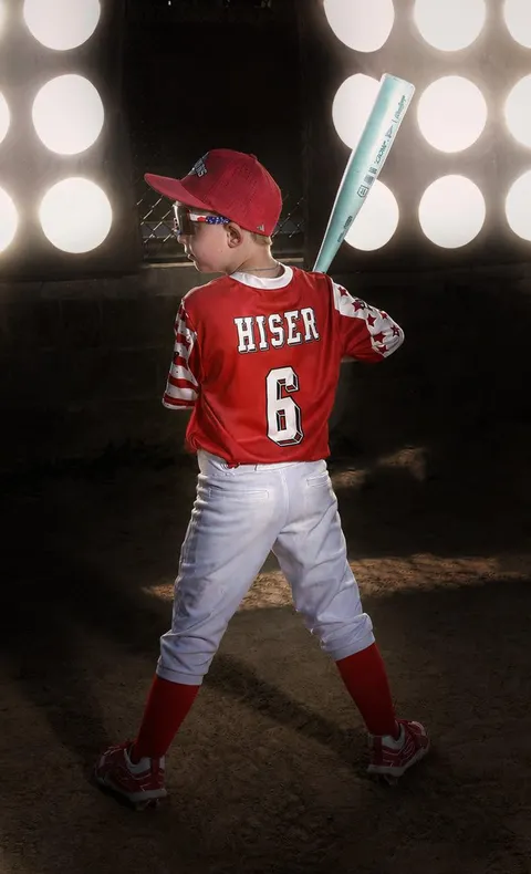 Hiser batting under stadium lights
