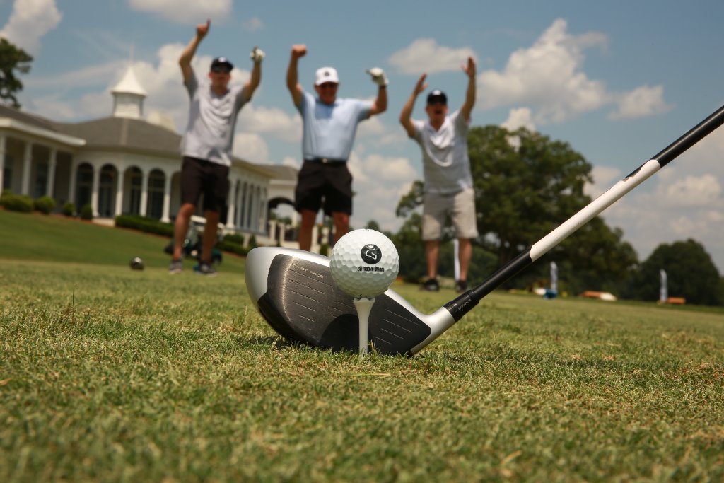 Golf ball and putter