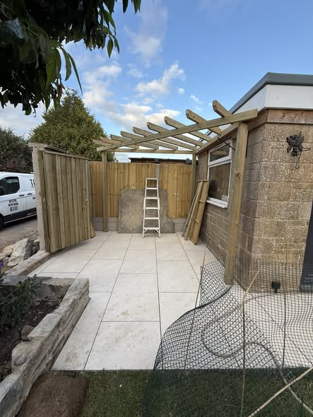 Complete Garden Transformation — Pergola, Porcelain Paving, Sleeper Wall, Pond & Turf photo 4