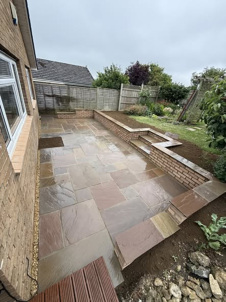 Raj Blend Patio with Retaining Wall — Levels Transformation photo 1