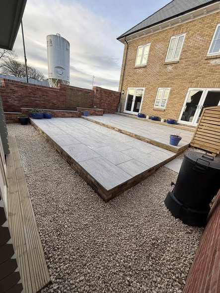 Two-Tier Porcelain Patio with Raised Flower Beds — Full Garden Transformation photo 4