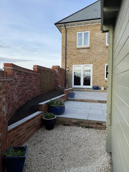 Two-Tier Porcelain Patio with Raised Flower Beds — Full Garden Transformation photo 2