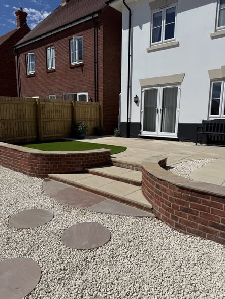 Remarkable Garden Transformation — Curved Walls, Sleeper Seating, Artificial Grass & Raised Planters photo 2