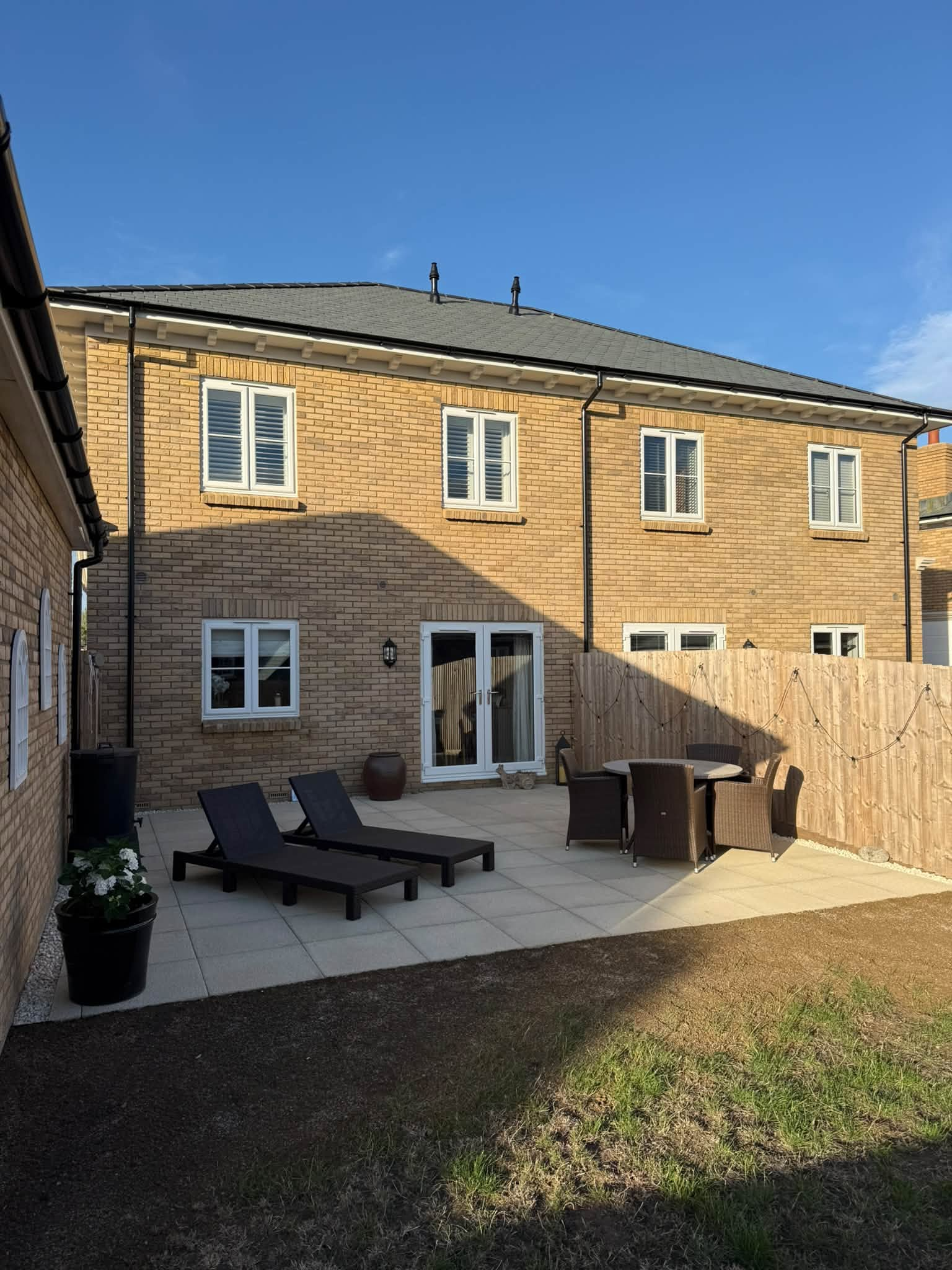Patios: Garden & Patio Transformation — 40m² Torver Buff Patio, Egg Chair Area & Cotswold Gravel Border