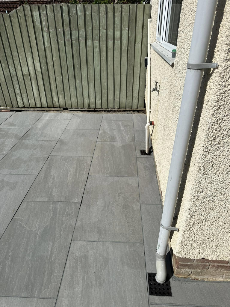 Porcelain Patio with Retaining Wall & Step photo 3