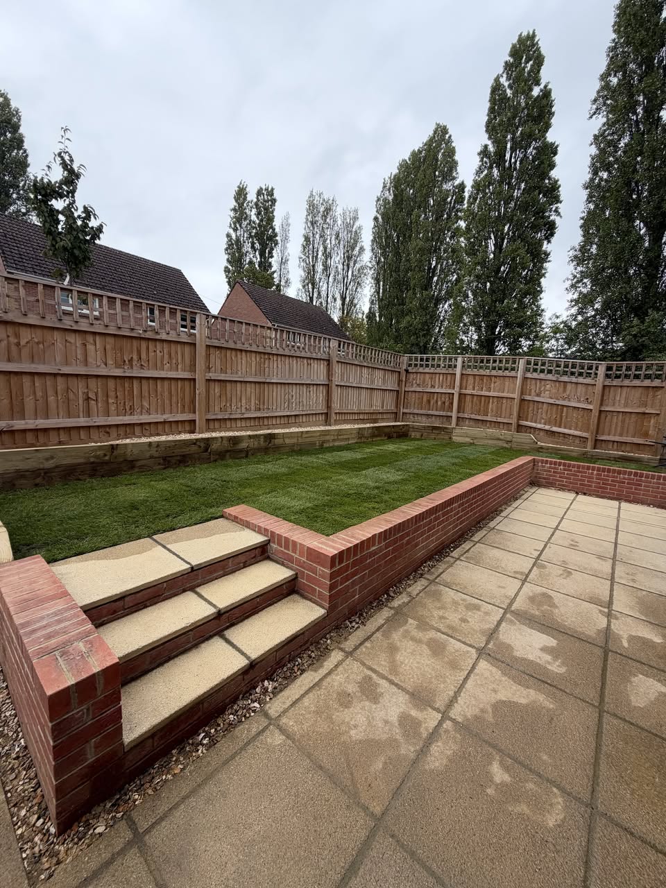 Garden Level Transformation: Sleeper Walls, Extended Patio, Turf & Bin Store photo 4