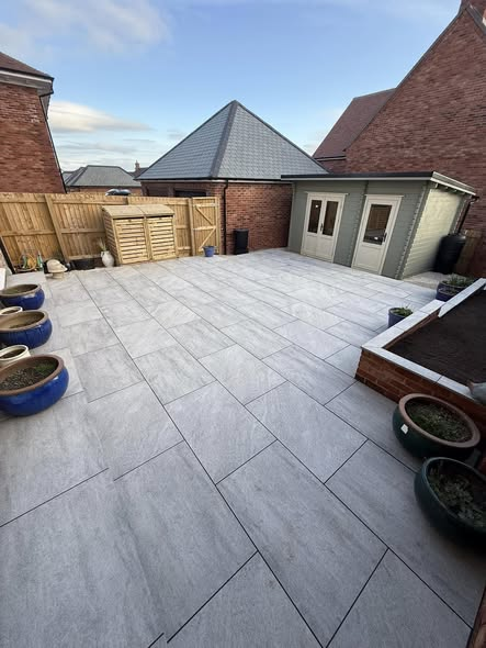 Two-Tier Porcelain Patio with Raised Flower Beds — Full Garden Transformation photo 3