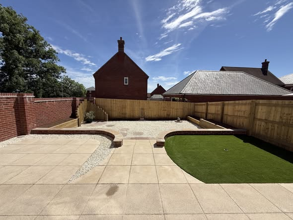 Remarkable Garden Transformation — Curved Walls, Sleeper Seating, Artificial Grass & Raised Planters photo 3
