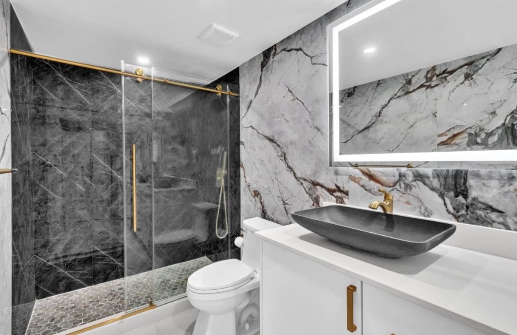 Dramatic Marble & Gold Bathroom