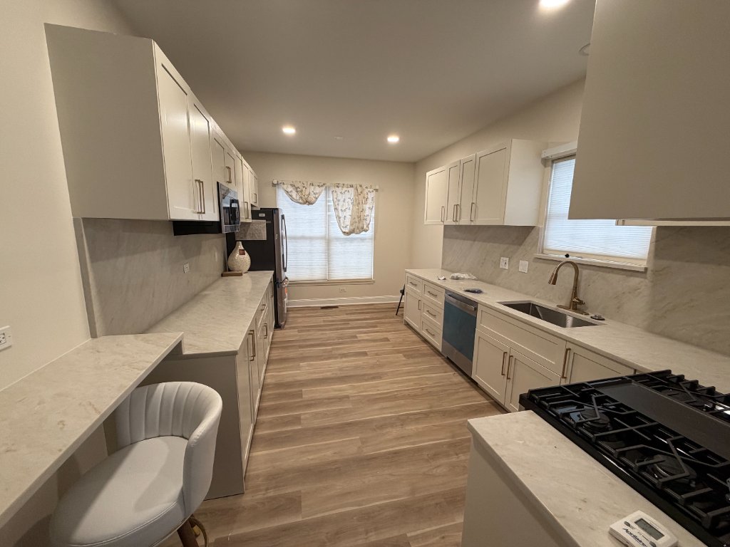 Modern White Kitchen with Full Home Renovation