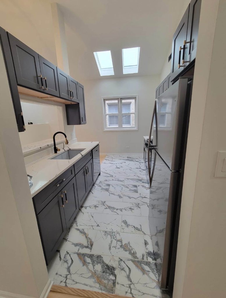 Dark Grey Shaker Kitchen with Marble Floor