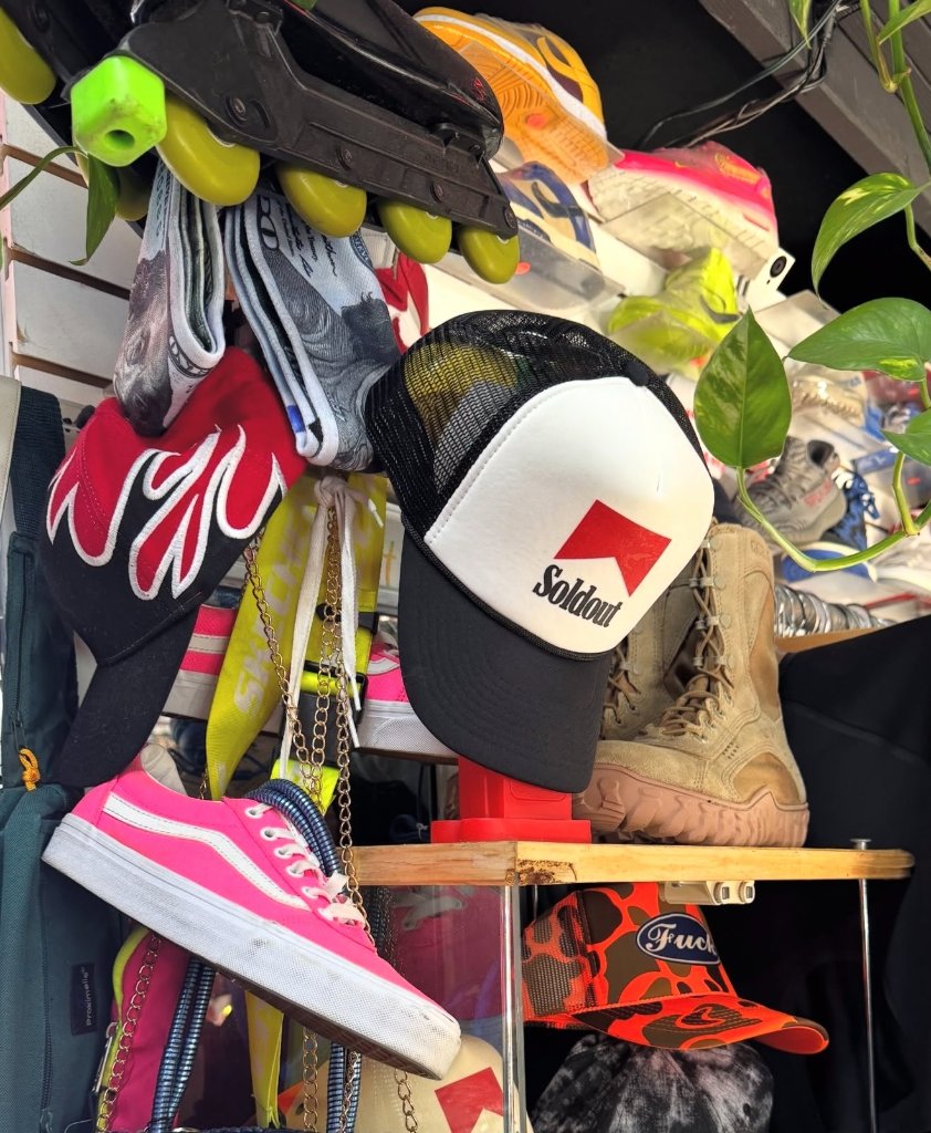 Sold Out Society cigarette logo Marlboro-style custom hat inside the shop downtown LA streetwear