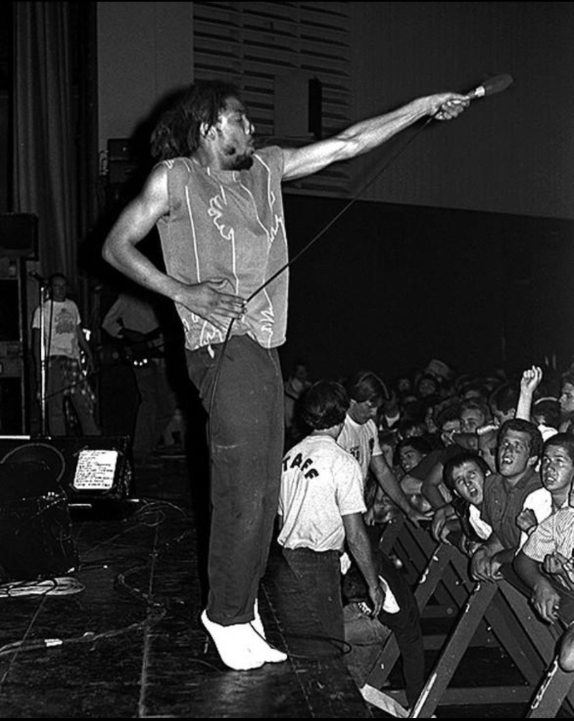 H.R. on stage with mic