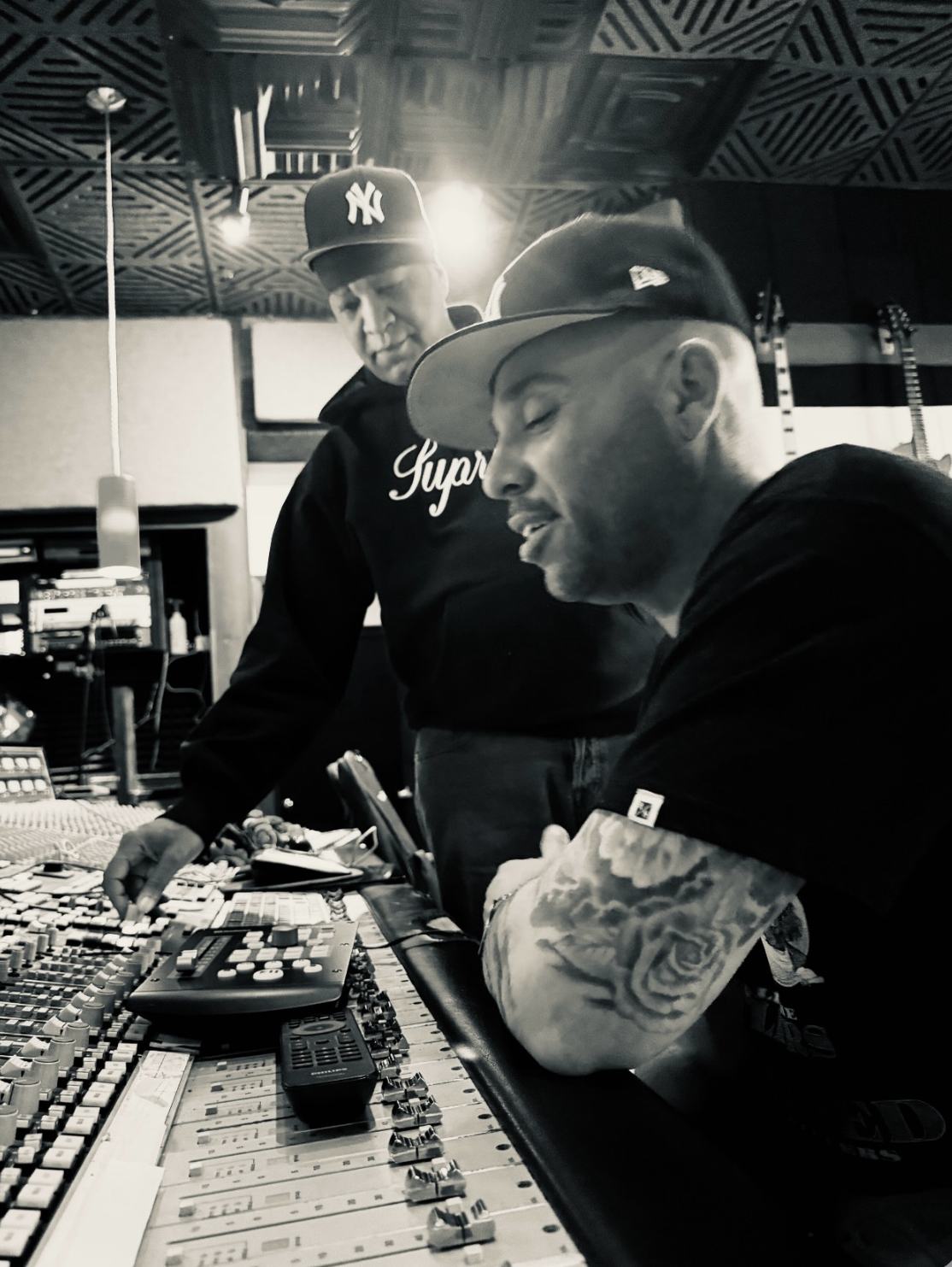 JoJo Pellegrino and DJ Doo Wop at the mixing console in the studio