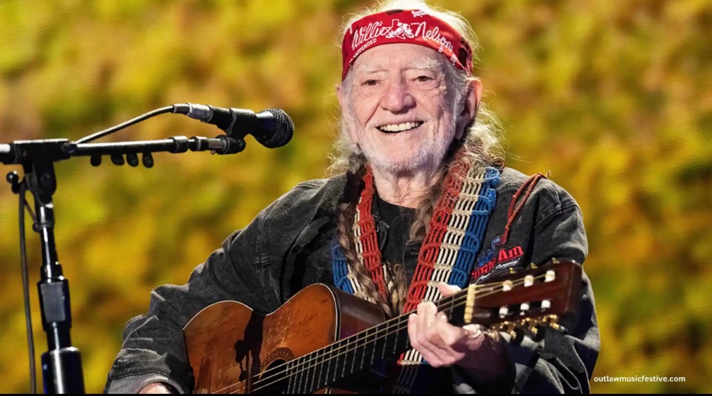 Willie Nelson performing live at the Outlaw Music Festival
