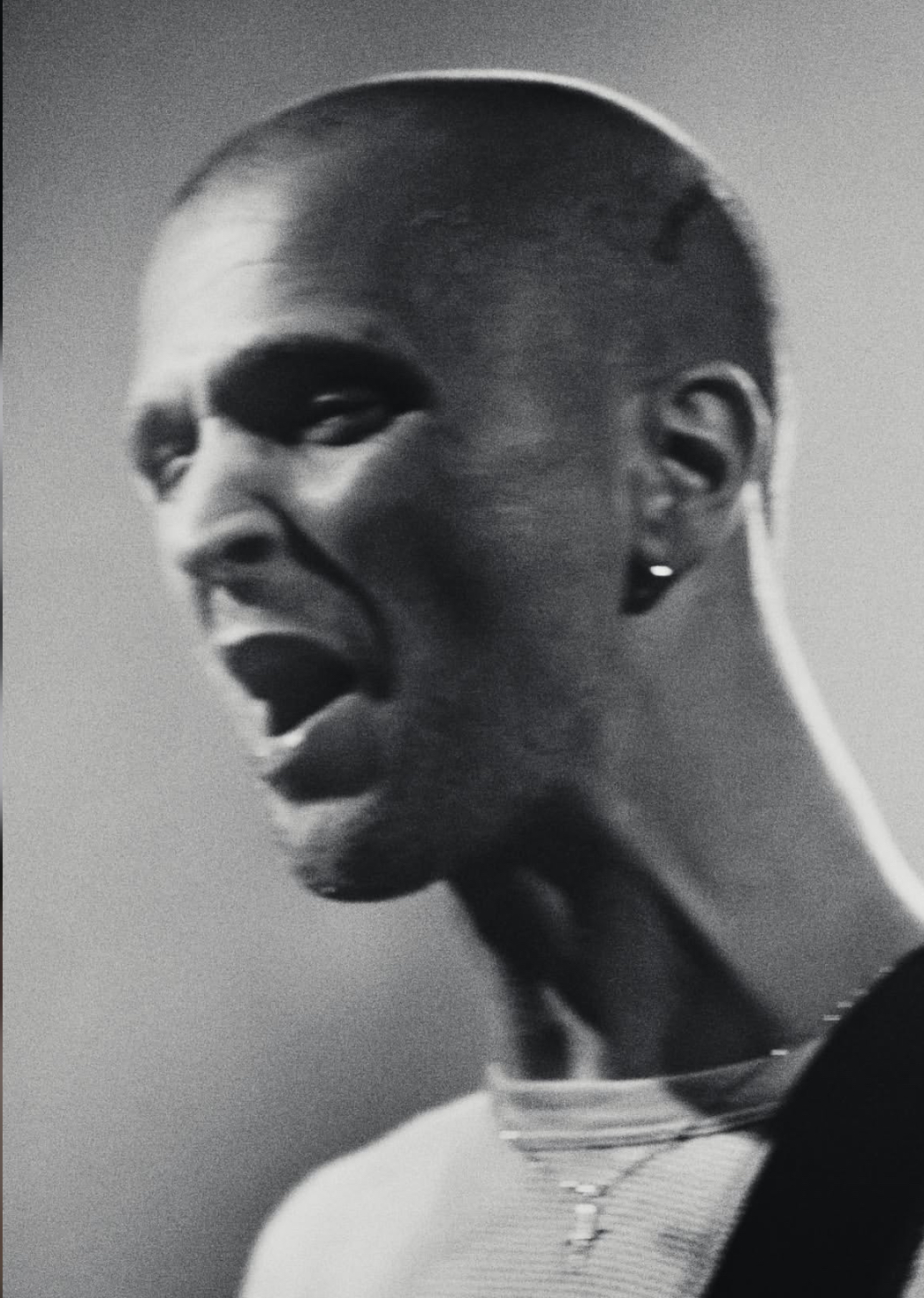 JMSN singing live on stage close-up portrait