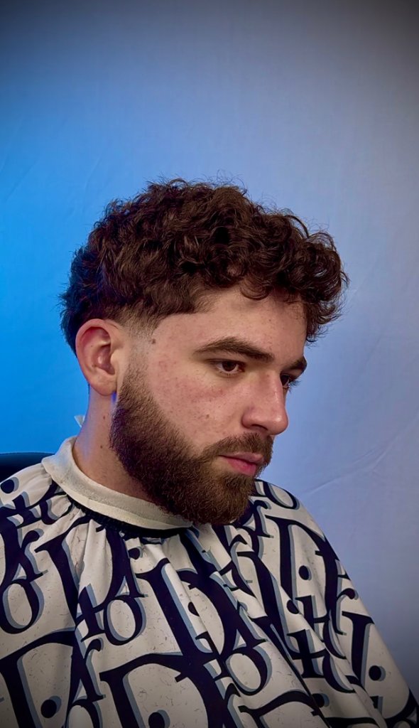 Curly fade with beard