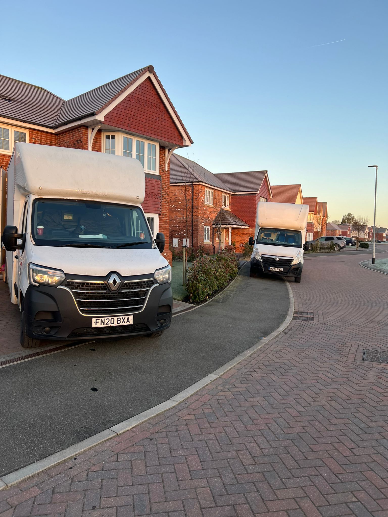 GM Moving Services vans