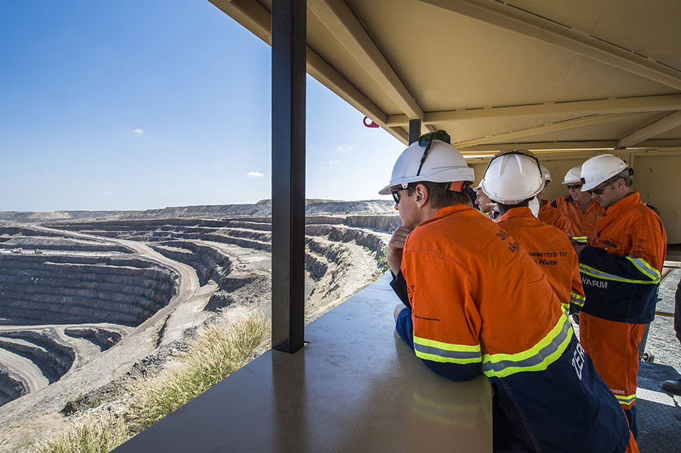 Mining crew working at an open-pit gold mining site in Africa