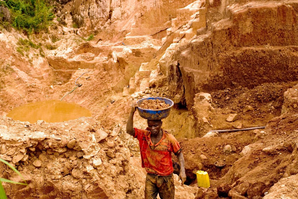 Riverside alluvial gold mining site in the Kibali region