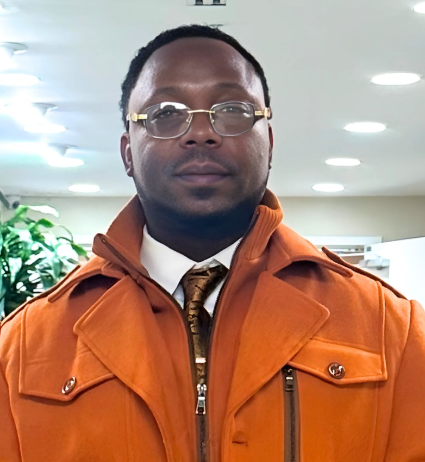 Executive Portrait — Orange Coat