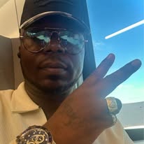 M.J. Evans — Travel Selfie (Airplane)