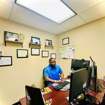 Office — At the Desk (Blue Polo)