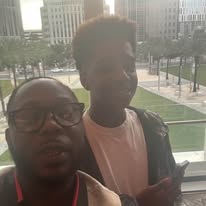 M.J. Evans & Guest — Event Selfie (Balcony)