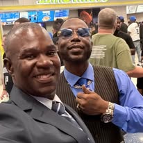 M.J. Evans & Guest — Event Selfie (Lobby)