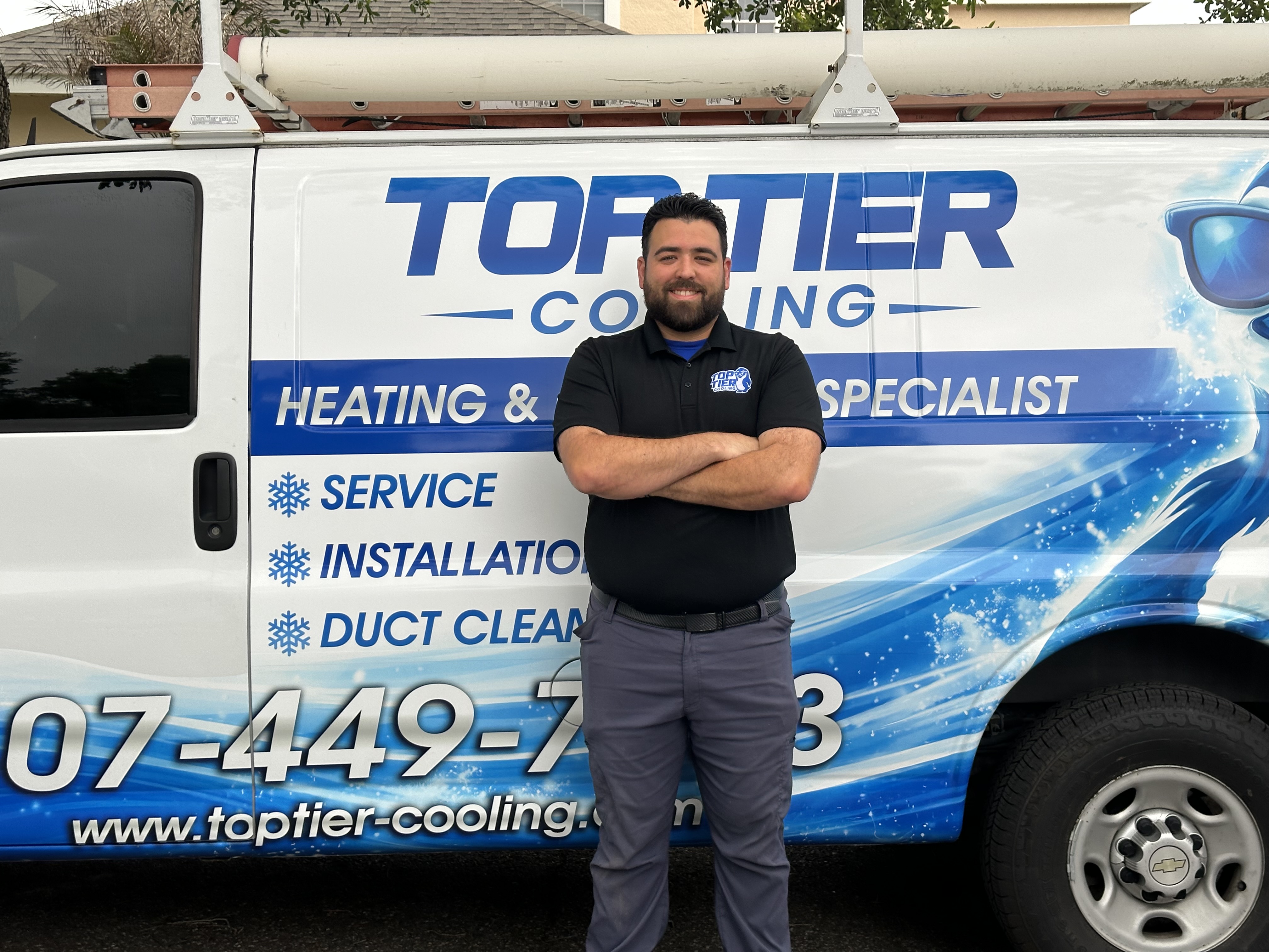 Top Tier Cooling HVAC technician ready for ductwork replacement service in Central Florida