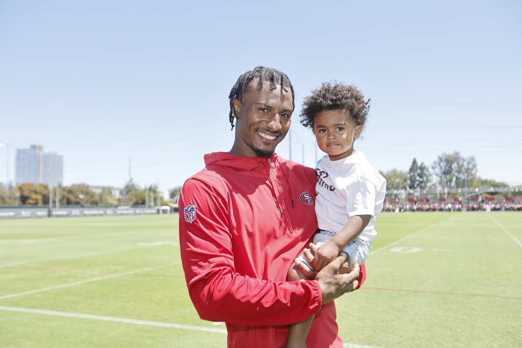 George Odum with his son at 49ers practice