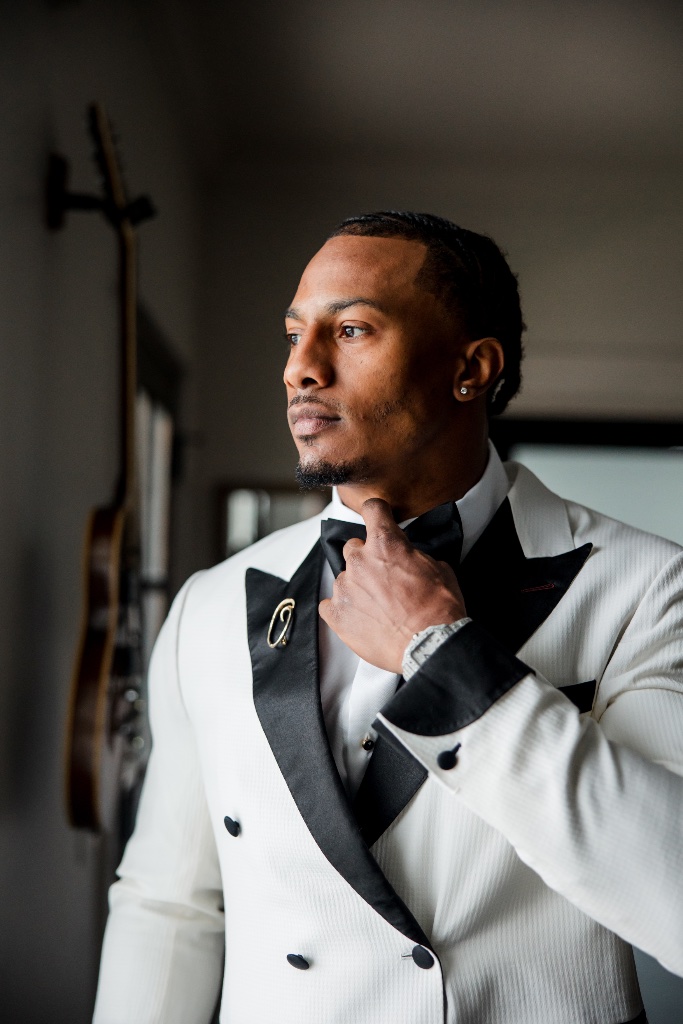 George Odum adjusting bow tie