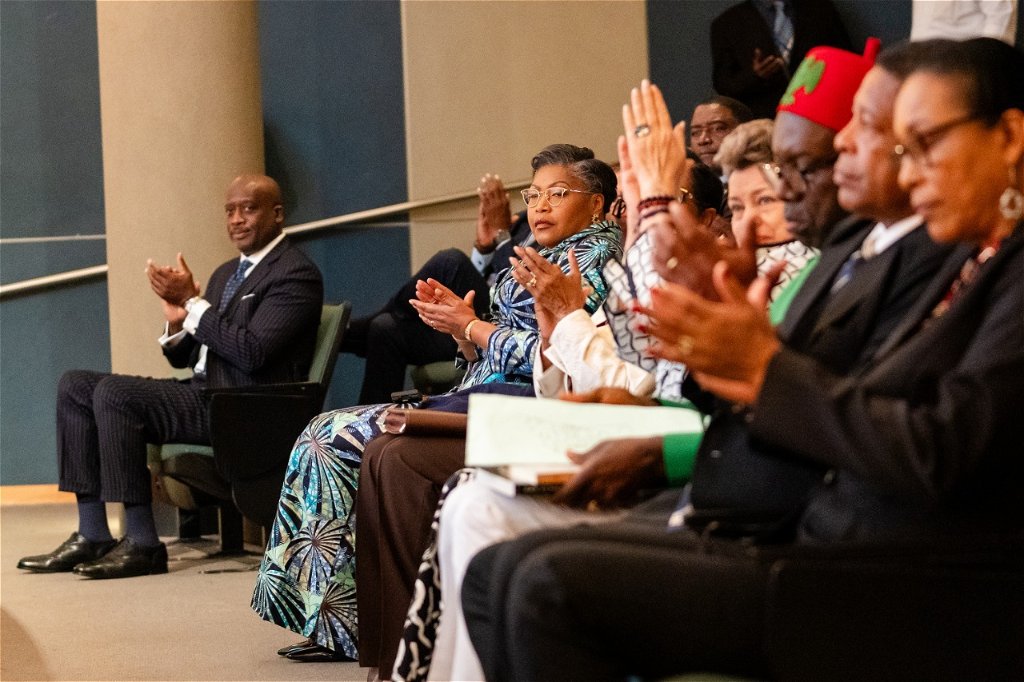 Forum delegates applauding