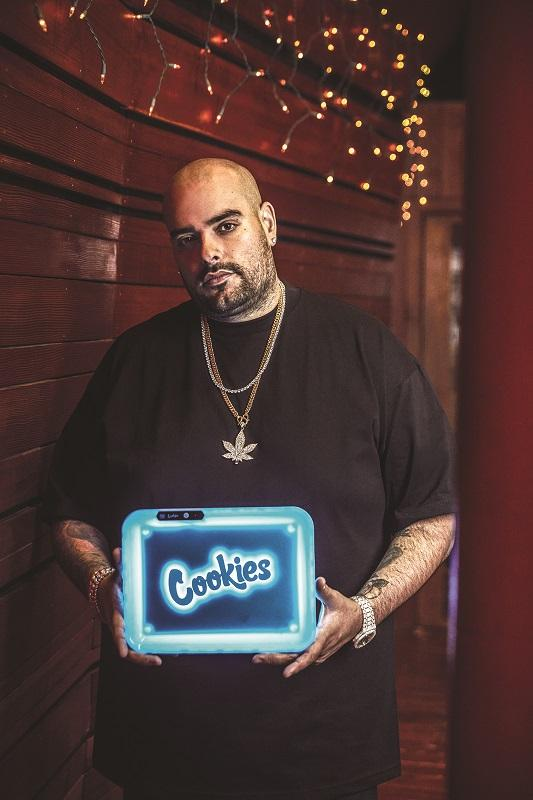 Berner, founder of Cookies, with the iconic blue rolling tray