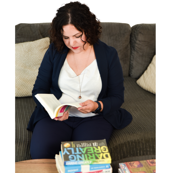 Shira reading on sofa