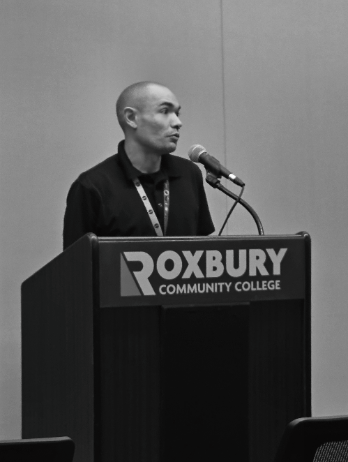 Adam C. Connell speaking at Roxbury Community College