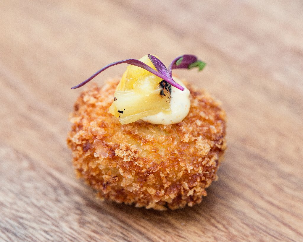 Elegantly plated dish prepared by Love Catering