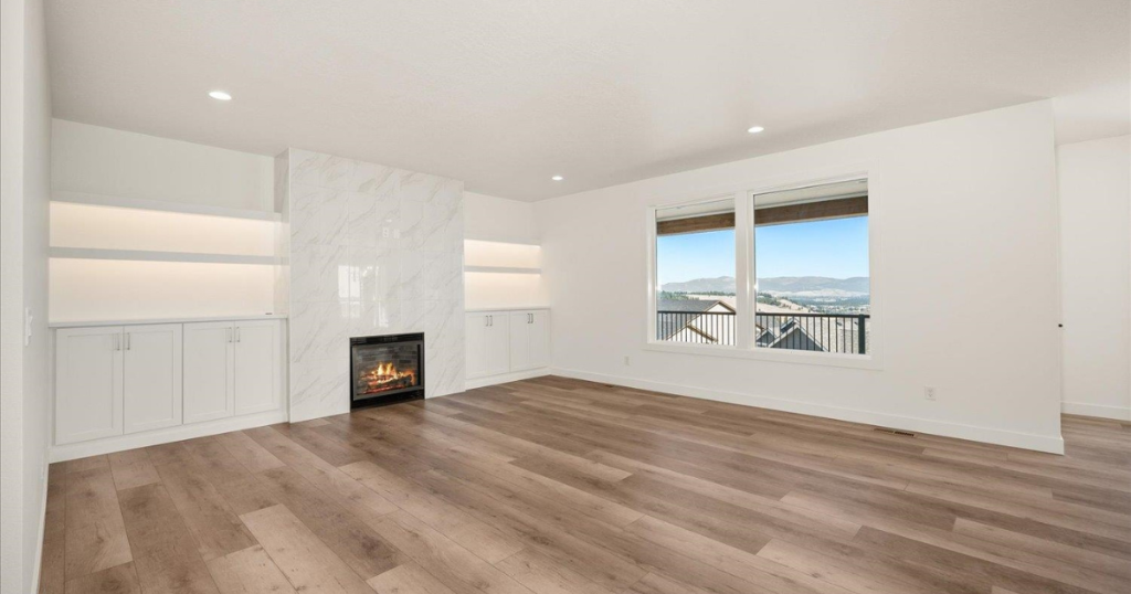 Living Room — Marble Fireplace & Built-ins