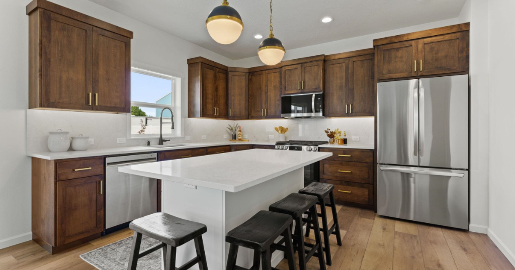 Kitchen — Walnut Cabinetry & White Island